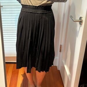 Black pleated Isabel Marat Étoile midi skirt